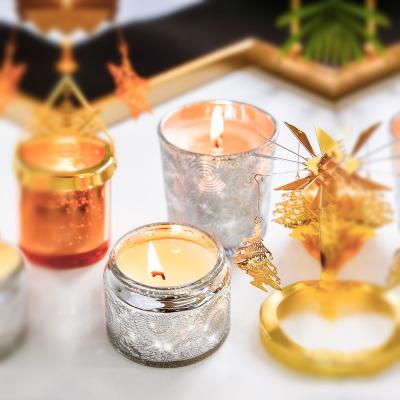 China Weddings Home Decoration Scented Candles Bulk Luxury Stars Carved Aromatherapy Soy Wax Scented Candles Glass Jar With Metal Lid for sale