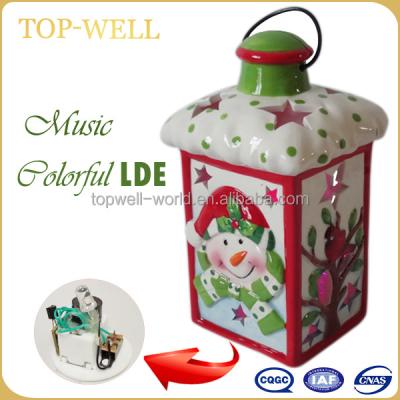 China Handmade Christmas decorative ceramic lantern small, with LED light and music Christmas decoration for sale