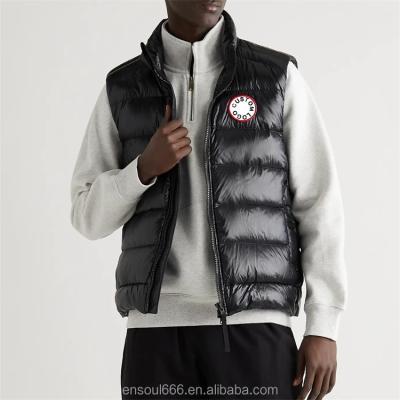 China Anti-wrinkle Wholesale Black Custom Patch Logo Funnel Neck 100% Nylon Waterproof Down Puffer Vest For Men for sale