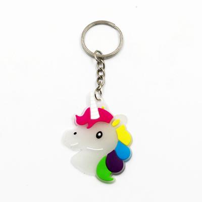 China Rising Lovely Unicorn Head Key Chain Personality PVC Small Key Chain Pink Cartoon Color For Girl's Bag for sale