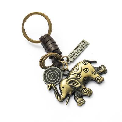 China Increasing Metal Leather Elephant Rope Ornament Fashionable Key Chain Punk Men Women Ornament Key Chain for sale