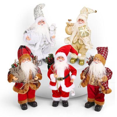 China Home Decoration Santa Claus Christmas Figurine Figure Decor Best Red Christmas Figurine Gift Holiday Party With Christmas Stocking And Gifts Bag for sale