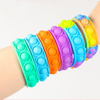 China Funny Educational Toy New Decompression Push Pop Bubble Silicone Wristband Stress Reliever Stir Sensory Toys For Kids Gift for sale