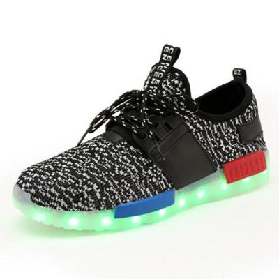 China Zapatillas de deporte recargables que destellan del adolescente LED para la larga vida de las noches del acontecimiento en venta