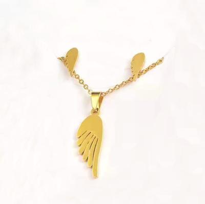 China 2021 High Quality Cheap CLASSIC Brand Wings Pendant Stainless Steel Jewelry Geometry Charm Necklace And Earring Set for sale