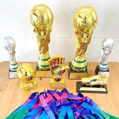 China Newest supplier wholesale custom resin insurance trophies award plastic football trophy for sports events team building for sale