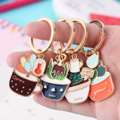 China Custom Enamel Cactus Plant Key Chain Cartoon Car Ornament Eco-Friendly Cute Metal Keychain for sale