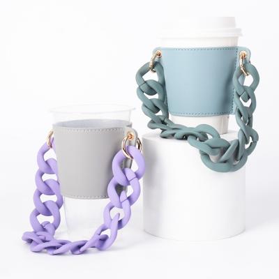 China Hot Selling Eco - Friendly Leather Chained Cup Holder Coffee Mug Sleeves With Chain Strap Handles for sale