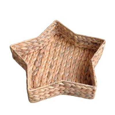 China Eco-Friendly Small Folding Water Hyacinth Storage Basket Star Handmade Tray For Decoration for sale