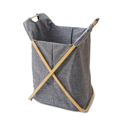 China Viable Custom Made Oxford Cloth Foldable Home Frame Bamboo Storage Basket Laundry Clothes Organizer Baskets for sale