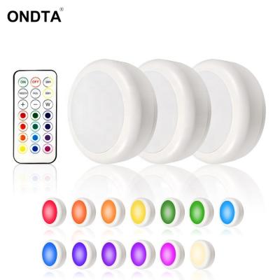 China RGBW Modern Wireless Color LED Puck Light Battery Operated Cabinet Light With Remote Control for sale