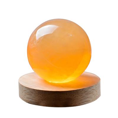 China China Crystal Stone Wooden Base Creative Calcite Healing Wholesale Crystal Ball Night Light Lamp for sale