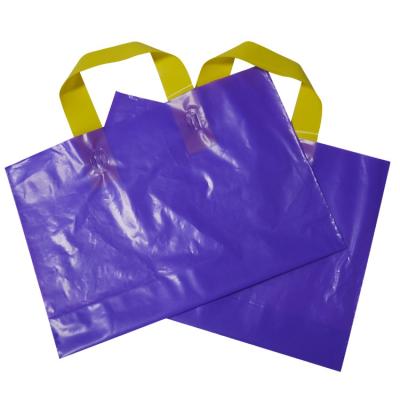 China Retail Shock Resistance Shopping Goodie Bag With Handles Die Cut Reusable Plastic Shopping Bags With Logos For Stores for sale