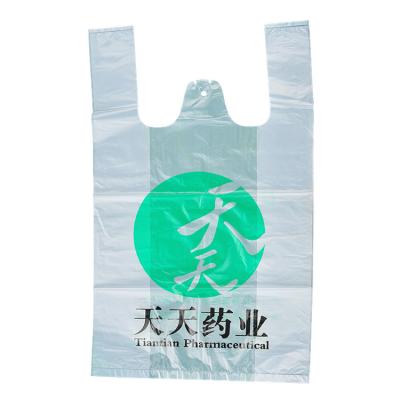 China BIODEGRADABLE high quality and cheap T-shirt bags with customized logo and picture size (280+90*2)*540 25mic for sale