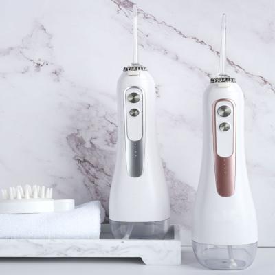 China Shenzhen Personal Care Home Use Oral Irrigator Rechargeable Jets Ozone With Waterproof Design for sale