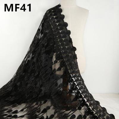 China Viable Wholesale Fashion Streamline Feather Black Embroidery Mesh Vertical Dress Lace Fabric For Women for sale