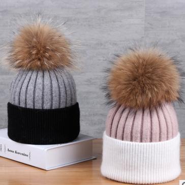 China breathable & Waterproof 16cm Raccoon Pom Poms Knitted Hat / Detachable Pompoms Winter Hats for sale