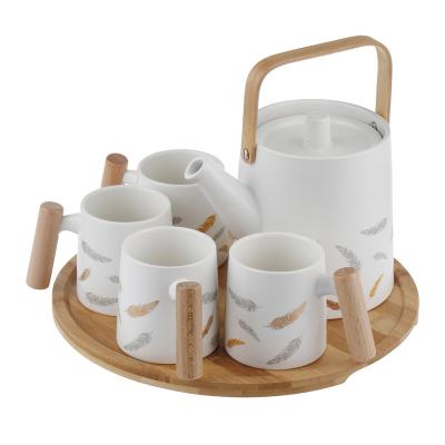 China Sustainable Nordic White Cup Sets For Coffee And Tea Net Red Feather Patterns INS Afternoon Tea Cup Set Wooden Whit Tray for sale