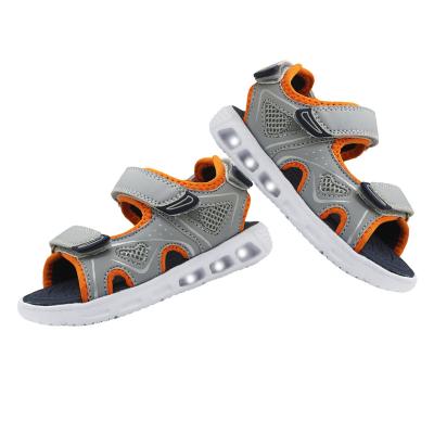 China Breathable Cool Boys And Girls Late Summer Happy Walking LED Lights Open Toe Lighting Sandals For Kids for sale