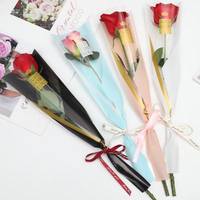 China 50pcs 45cm Virgin Plastic Flower Packaging Florist Bags Rose Bags Flowers Wrapping Paper Single Valentine's Day Roses Bags for sale