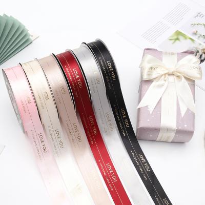 China Holographic Hot Stamping Printing LOVE YOU Gift Ribbon Custom Wholesale Price Ribbon Flowers Rose Wrapping Ribbon Valentine's Day for sale