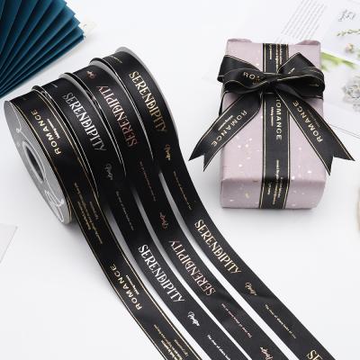 China Gold holographic lightweight luxury black ribbon perfect for flower wrapping, wedding decor, arch making, gift wrapping and more for sale