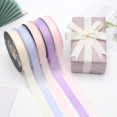 China Custom 20mm Holographic Flower Wrapping Grosgrain Ribbon Tie Cake Box Gift Wrapping Ribbon Valentine's Day Gift Decorative Ribbon for sale