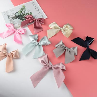 China Custom Recyled 8 Dots Packaging Decorative Ribbon Bows Gift Bow Pull String Ribbon Bows Maker for sale