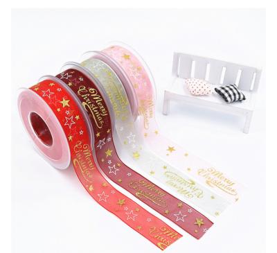 China Recyled Bronzing Powder Snow Yarn Ribbon Christmas Gift Wrapping English Five-pointed Star Printing Dream Yarn Ribbon for sale