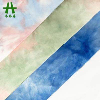 China Hot Selling Stretch Mulinsen Textile Tie Dyed Scuba Suede Fabric Manufacturers for sale