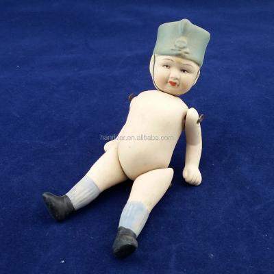 China MODEL TOY Hot selling ceramic porcelain toy baby figurine with flexible arms and legs for sale