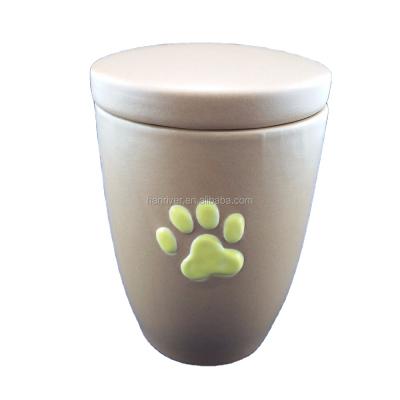 China Hot Sale Stored Ceramic Pet Urn Casket With Cover With Hand Paint Paw Mark For Pet Ashes for sale