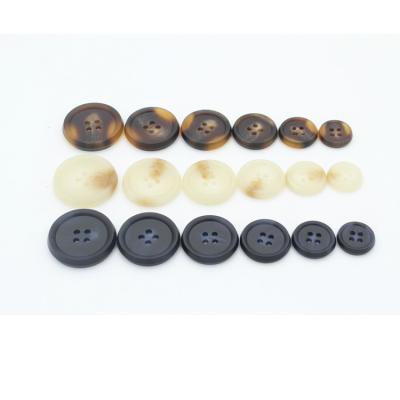 China Resin Plastic 4 Holes Classic Widely Used Dry Cleaning Wear Resistant Custom Buttons for sale