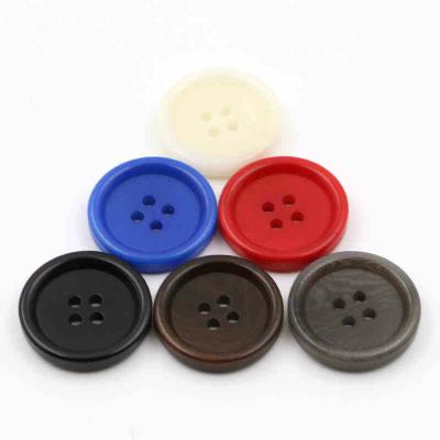 China Custom natural white good quality 4 hole corozo eco button dry cleaning for sale