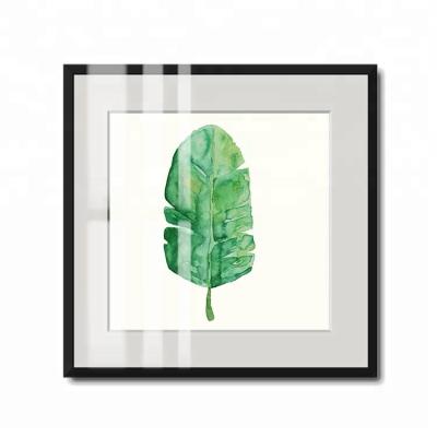 China Environmental Friendly Morden Picture Frame Art Print Green Leaf With Plain White Mat In Black Wood Frame Under Glass For Wall Decor for sale