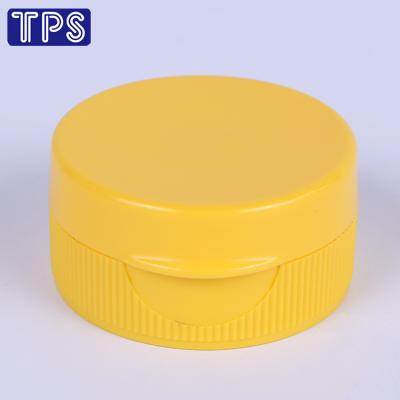 China Non Spill Traditional 38-400 Flip Top Cap With Silicone Valve, With Induction Seal Coating for sale