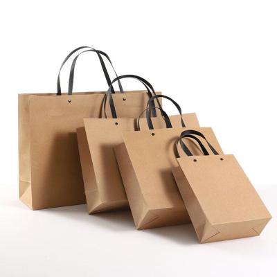 China Handmade Wholesale Brown Craft Custom Kraft Paper Bag With Handle for sale