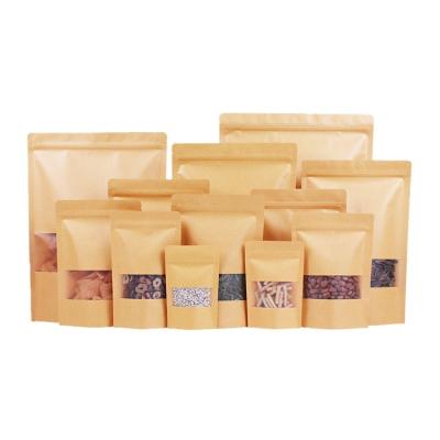 China Recyclable Recycle Stand Up Pouch Ziplock Dried Biodegradable Kraft Paper Packaging Bag With Window Kraft Paper Pouch For Food for sale