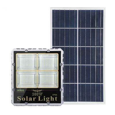 China Outdoor garden floodlight ip65 stadium led light solar lighting with solar panel lamp garden light for sale