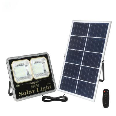 China 100W 200W 300W 30W 60W Solar Powered Outdoor Garden IP66 Solar LED Flood Lamp Solar Powered Flood Light for sale