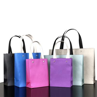 China Recycled Materials Vanguard Customized Printing Gold Blocking Kraft Special Paper Shopping Bags With Your Own Logo for sale