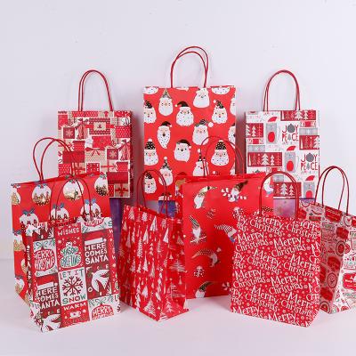 China Wholesale Recycled Materials REYOUNG Gifts Wrap Bag Packing Kraft Merry Christmas Paper Bags For Gift Package for sale