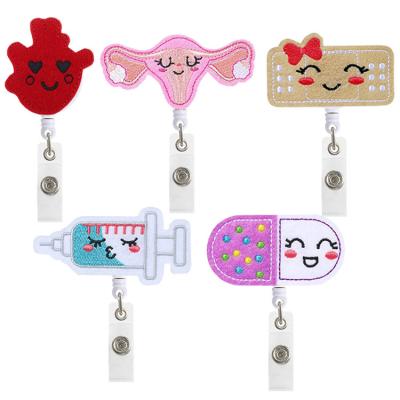 China Wholesale Medical IDcard Holder Hearts Shape Stethoscope Nurse Retractable Felt Badge Holder Reels for sale