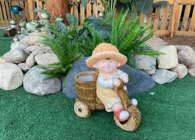 China Outdoor Magnesium Oxide Garden Statue Sculpture Small Children Riding Statue for sale