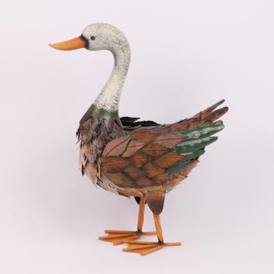 China Add a Touch of Whimsy to Your Garden Animal Garden Metal Duck Sculptures With 3D Feather for sale