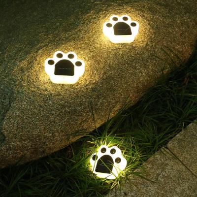 China Solar Dog Cat Animal Paw Print Lights LED Garden Path Lawn Yard Decor Outdoor Solar Lamp for sale