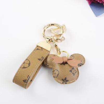 China Luxury Where To Buy Designer Keychain Shoes Online iGUUD TECH Luxury Mirror Key Chain Best Ring Bangle Keychain Supplier for sale