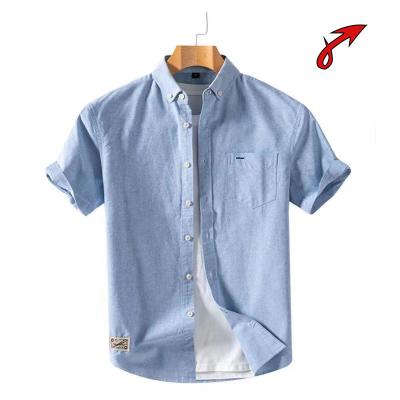 China Summer Men's Anti-pilling Cotton Short Sleeve Shirt Casual Loose Jacket Oxford Half-Sleeved Spinning Shirt for sale