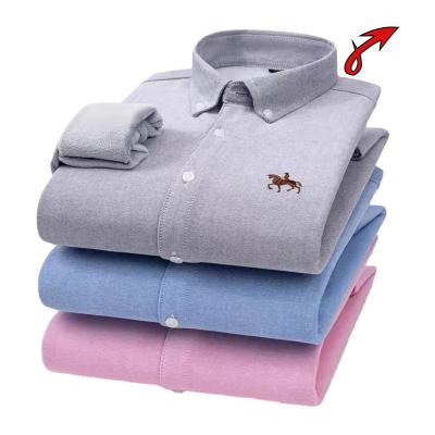 China Autumn and winter men's models anti-pilling Oxford cotton turning casual long-sleeved padded thickened shirt cotton solid color warm shirt for sale