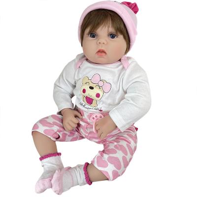 China High Simulation Sitting Girl Have Pink Hat Look Like Real 22inch 55cm Girl Handmadede Rebirth Doll for sale